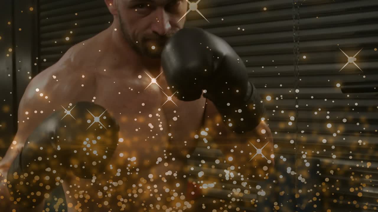 Male boxer warming by roll-up door, raising gloves to jab and duck with gold glitter overlay