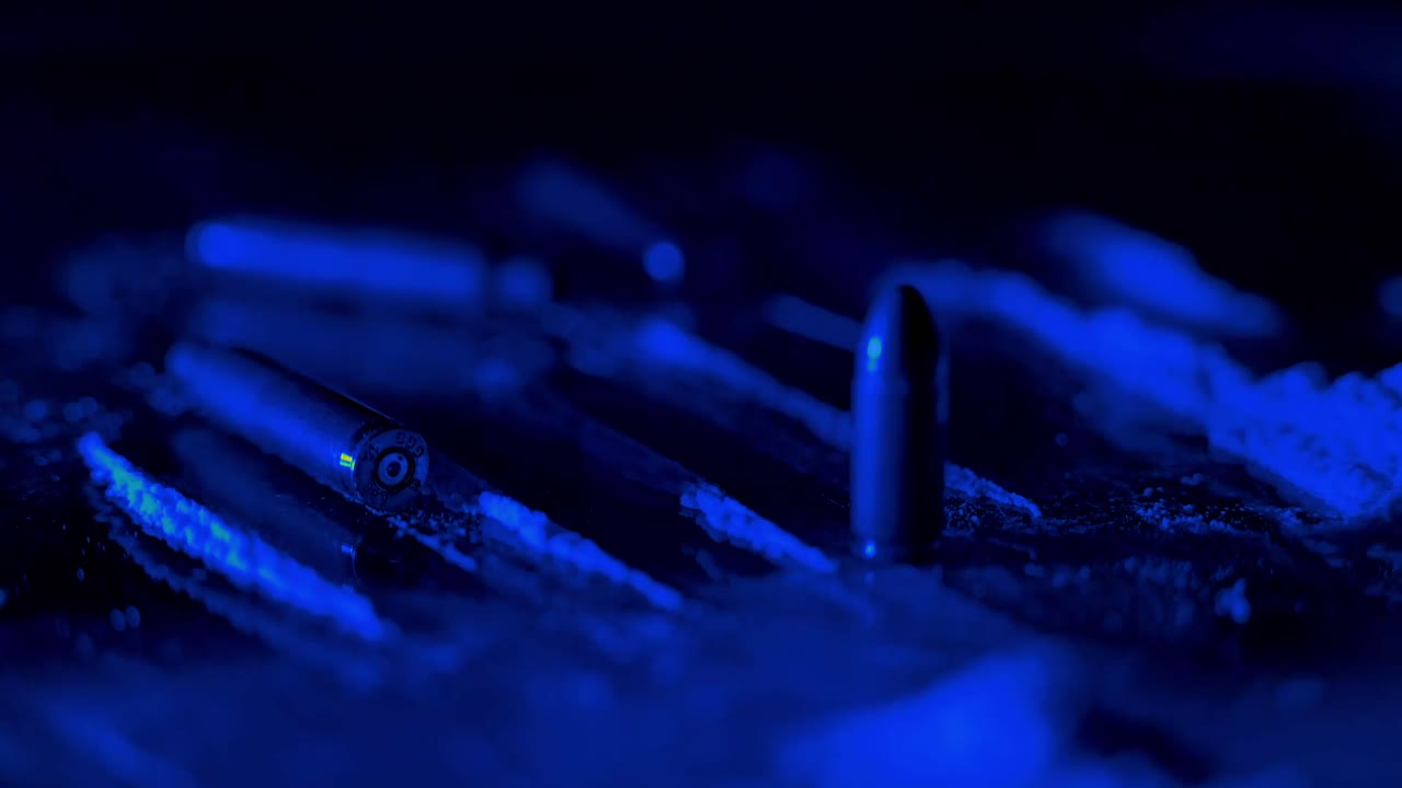 Stylized blue light image showing human struggle between control and destruction