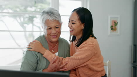 laptop, finance and a daughter hugging her mother