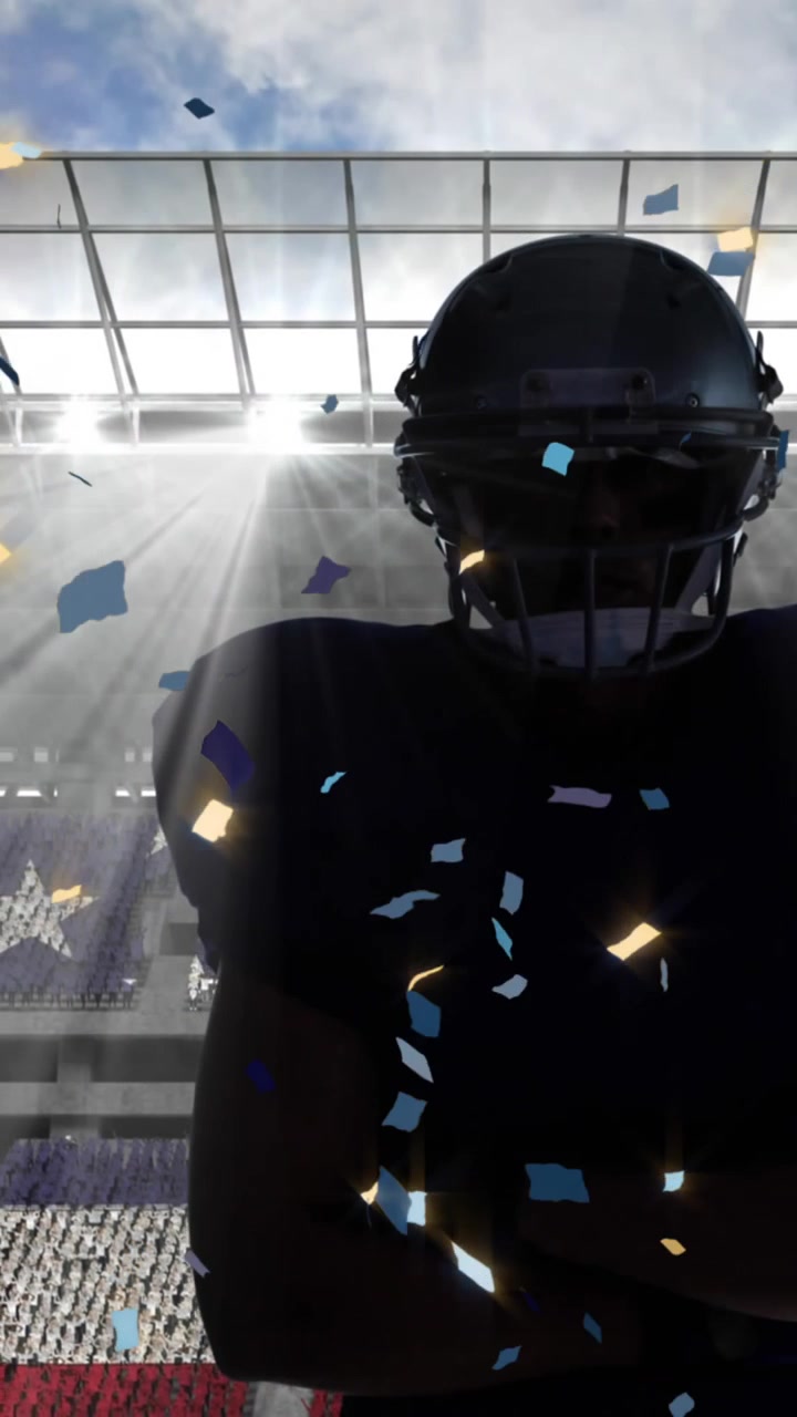 Confetti falling over male rugby player wearing a helmet against sports stadium