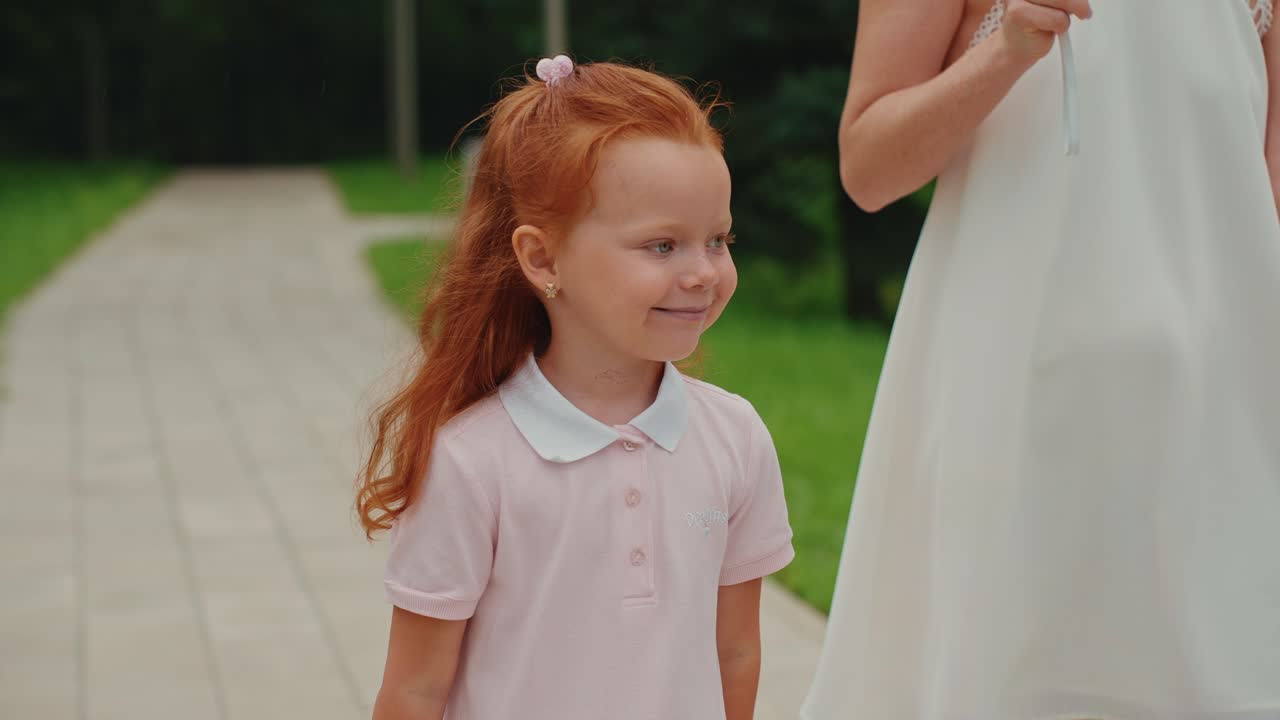 Girl and Mother in Park
