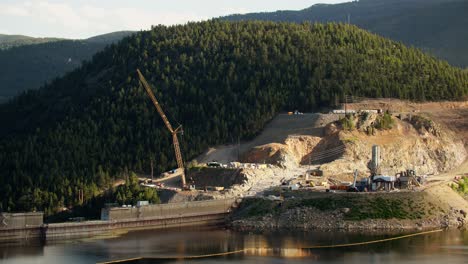 A-construction-crane-working-on-the-dam-at-Gross-Reservoir-in-Boulder-County,-Colorado,-USA