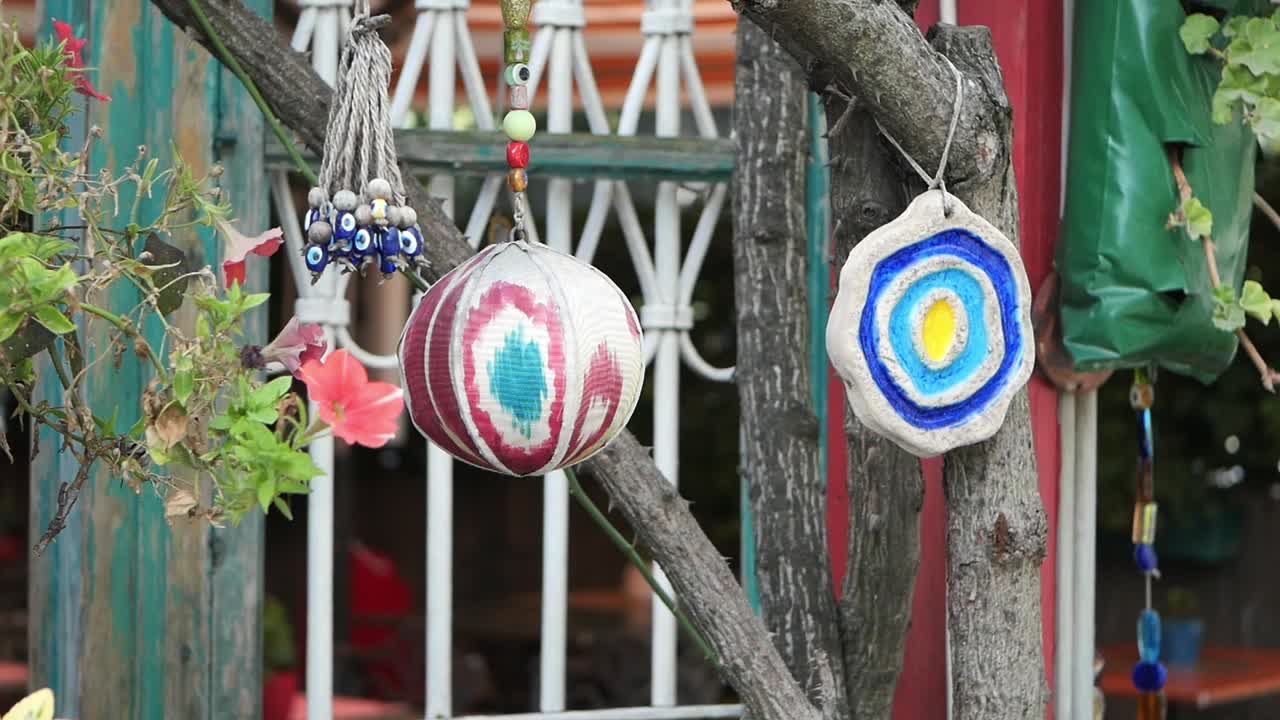 Colorful Handmade Decorations in a Garden Setting