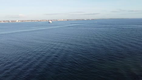 aerial view of the beautiful oresund strait between the coasts of helsingor and helsingborg with a calm northern sea on a bright sunny afternoon, denmark