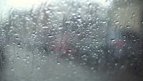 drops of rain on the window of the car close up