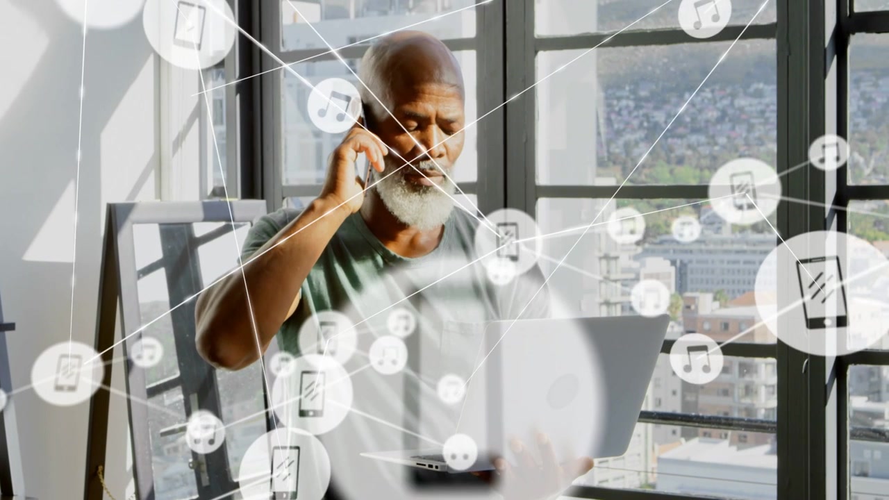 Professional man juggling laptop and phone while animated icons forming overlay for remote work
