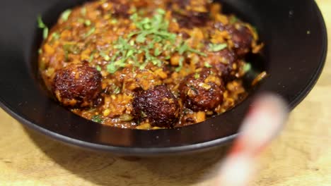 delicious chinese food close up shot severed in black bowl