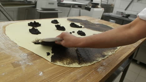 preparing pastries with filling