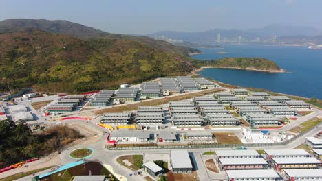 Covid19-Quarantine-compound-buildings-in-the-outskirts-of-Hong-Kong,-Aerial-view