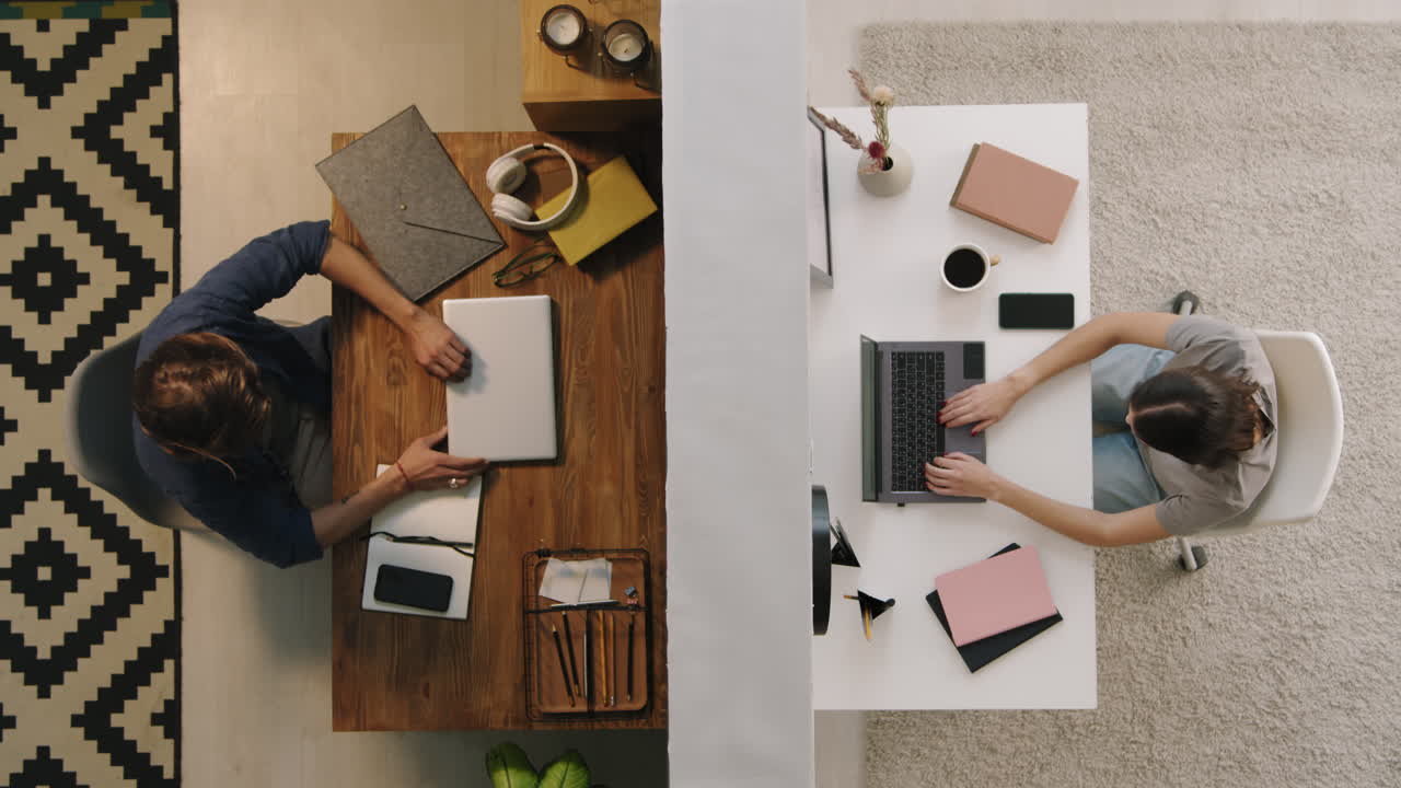 Top View of Man and Woman Working from Home
