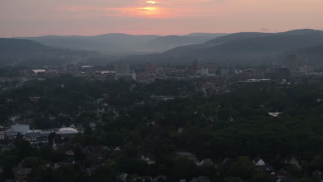 aerial view of binghamton, new york at sunrise. shot during the summer in 4k.