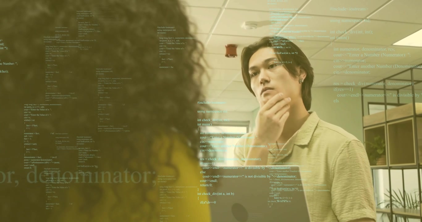 Man raising hand and explaining tech code overlay while designer gesturing and woman noting issues