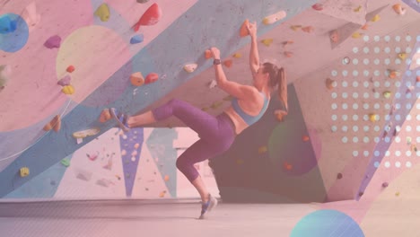 Abstract-colorful-shapes-against-caucasian-fit-woman-wall-climbing-at-the-gym