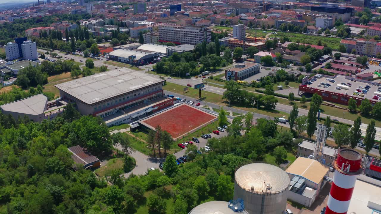 Drone shot of factory and buildings in the city center of brno