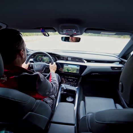 vinnitsa, ukraine - september 2019: audi e-tron electric suv car. interior detail view with controls