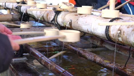 tradition for hands washing before entering the temple in japan culture