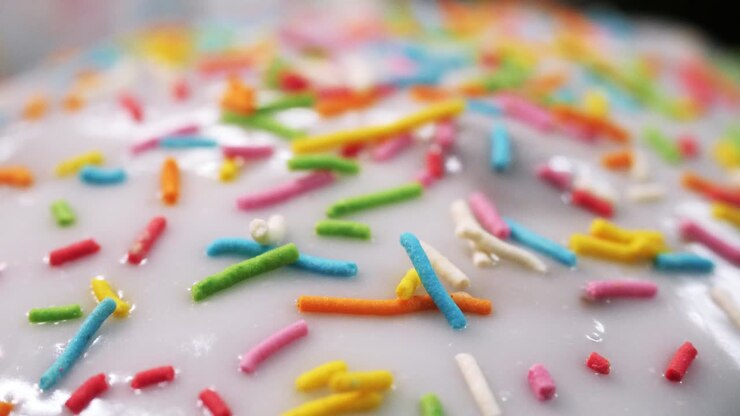 Close-up of decorated Easter bread with colorful sprinkles