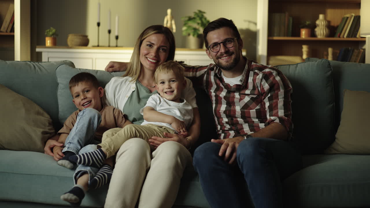 A happy family portrait on a couch
