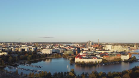 Golden-evening-aerial:-Protected-marina-in-Helsinki-Finland-city