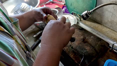 sequential dishwashing process at a kitchen sink