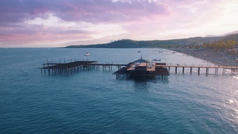 sunset beach pier with wooden structures