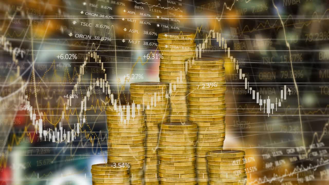 금 동전  ⁇ 어리 위의 금융 데이터 처리 애니메이션