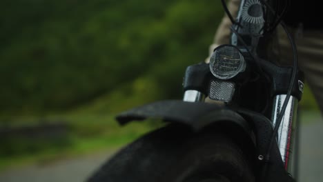 Mid-shot-of-bicycle-light-turning-on