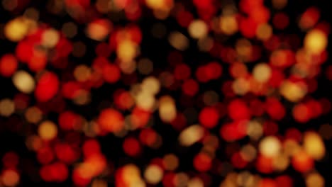 luces de navidad. año nuevo festivo borroso amarillo dorado, fondo rojo y negro. hermoso fondo vertical brillante, textura. xmas.