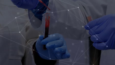 animation of network of connections over diverse doctors holding test tubes