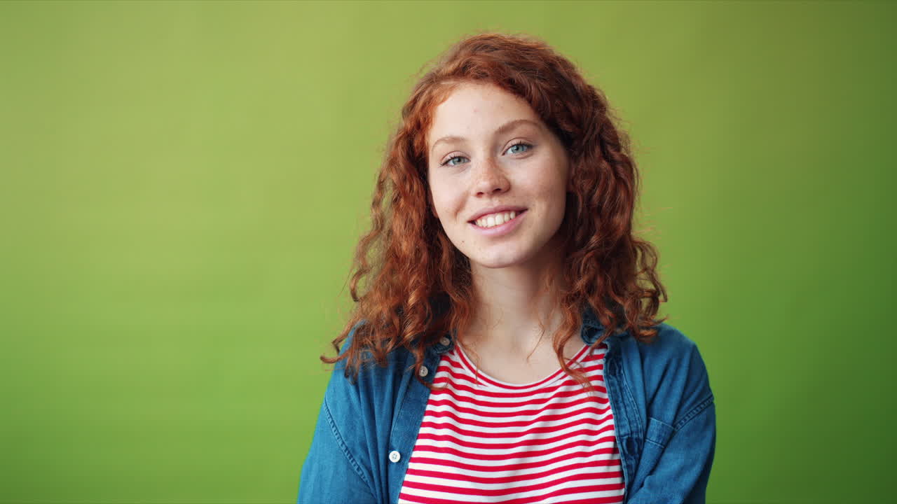Young Woman Making Call Me Gesture