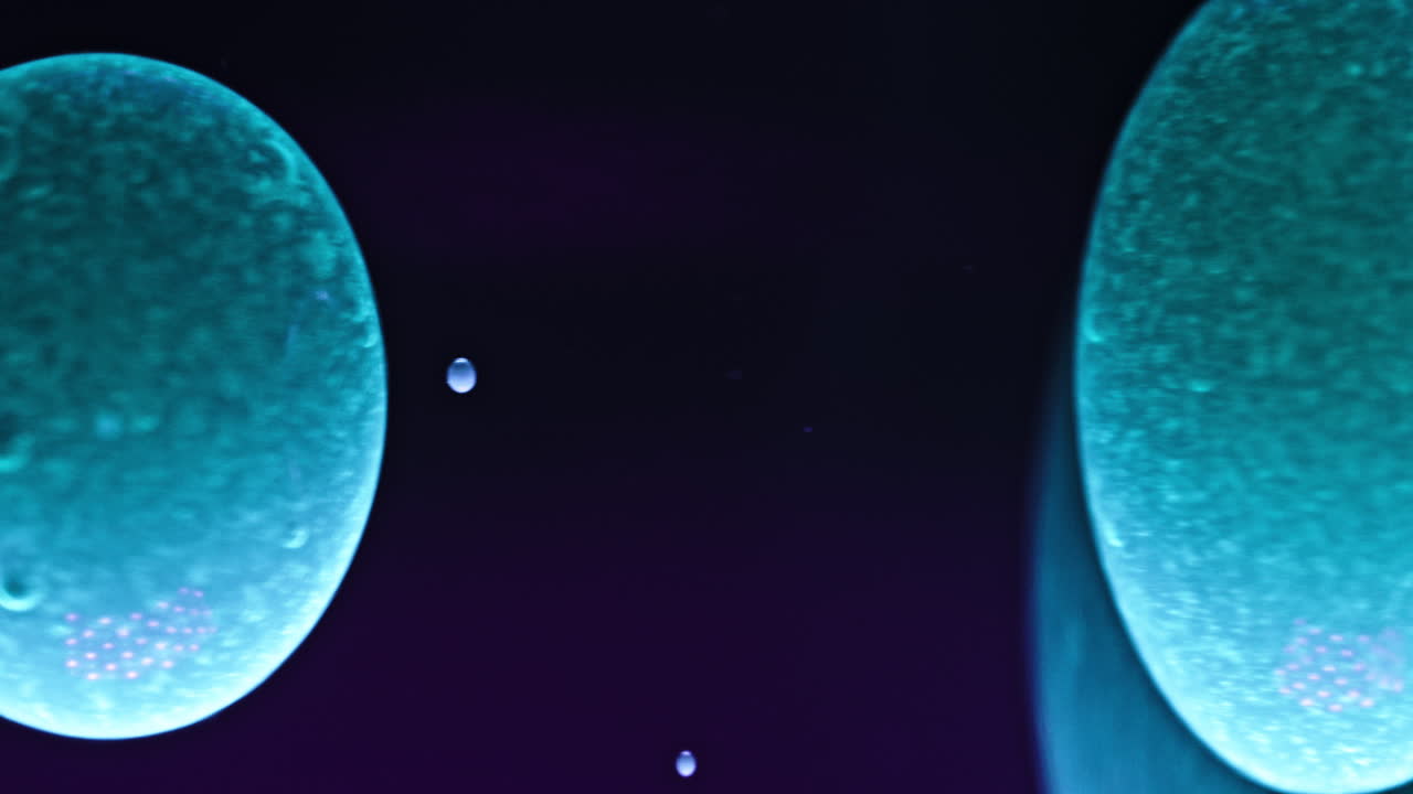 Swirling colorful liquids mix in an abstract macro shot, showing vibrant patterns and textures