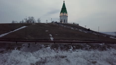 a russian chapel on a hilltop at dawn