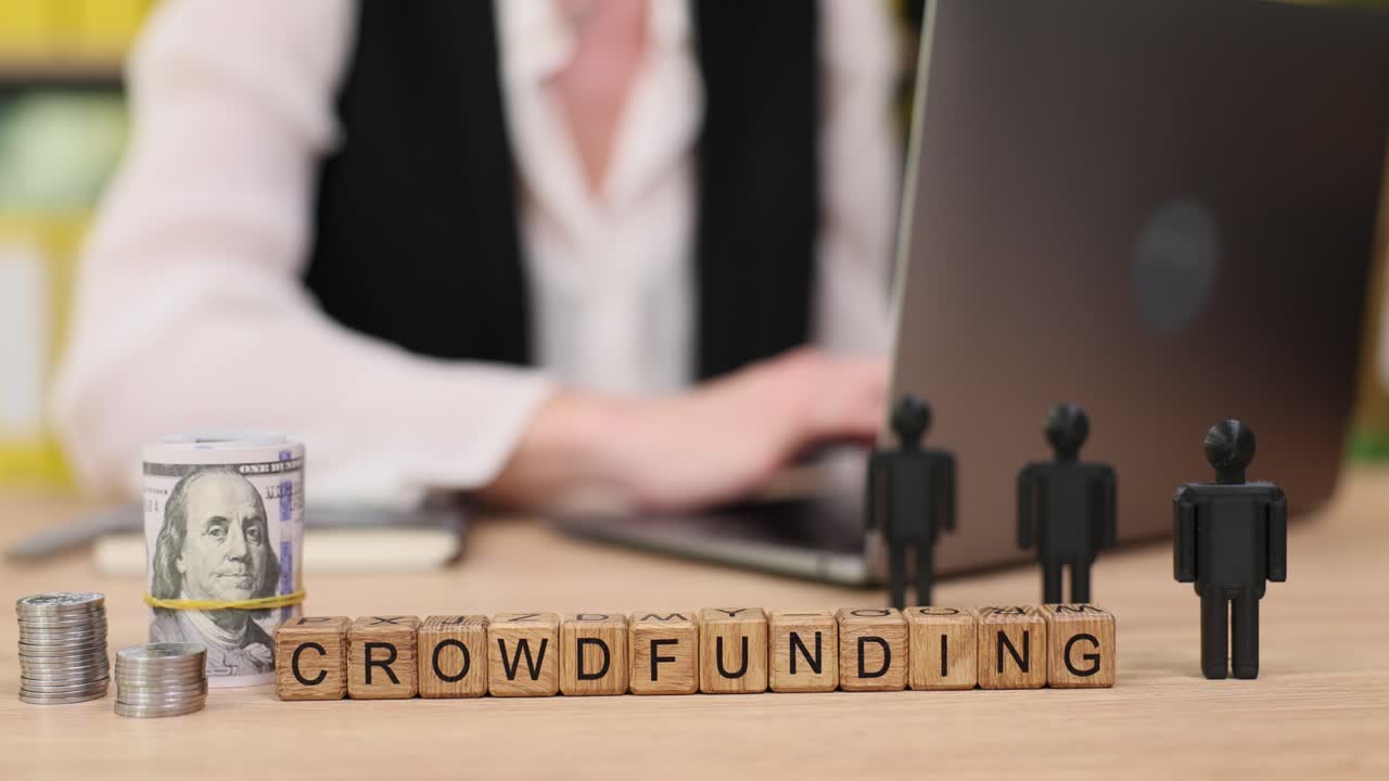 Crowdfunding concept with money and people figures