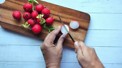 Fresh-red-radish-bundle-on-table--high-quality-photo