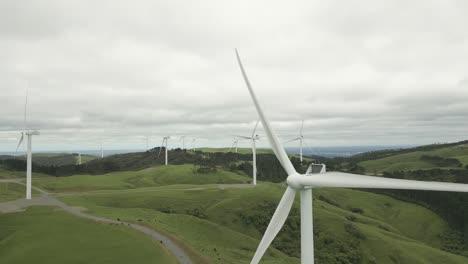 Close-Up-drone-shot-of-wind-turbine-in-New-Zealand