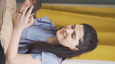 Vertical-video-of-The-woman-on-the-phone.