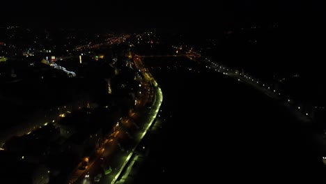 nighttime traffic with city lights in passau germany