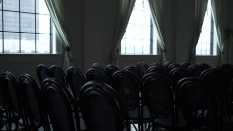 chairs lined up in a funeral home in preparation of a funeral service