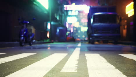 vibrant city alleyway illuminated by neon lights at night