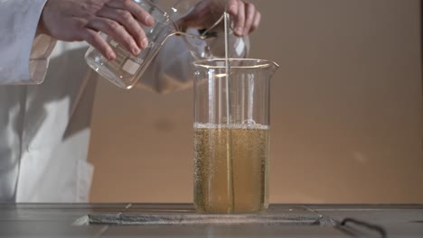 lab glassware with liquids