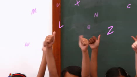 animation of letters over diverse schoolchildren raising hands school