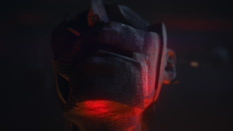 crushed and burned android head on spike in hell