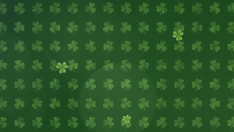 animation of green clovers in background for st. patricks day