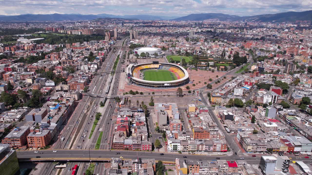 Bogota, Colombia. Aerial View of El Campin Neighborhoods, Football Stadium, Buildings and Traffic