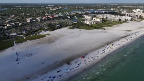 tourists and locals alike flood the outer gulf beaches of siesta key during the lake summer weekends