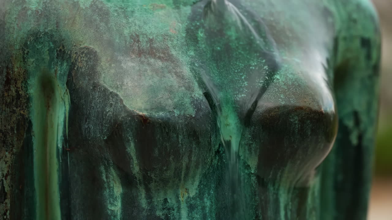 Weathered Bronze Statue of a Female Torso with Green Patina