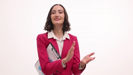 professional woman clapping and smiling with clipboard