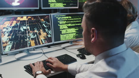 specialists fighting hacker attack
