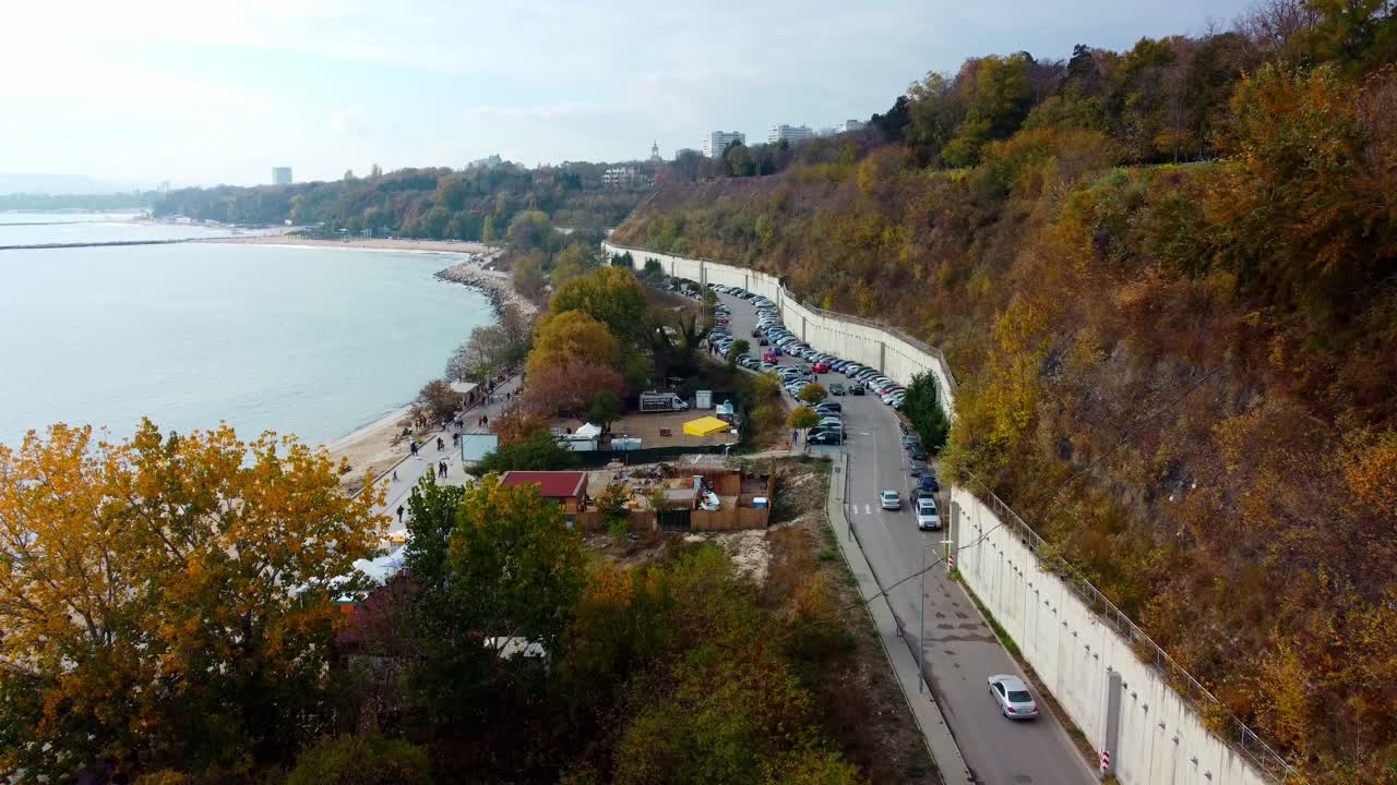 Aerial drone view of road parallel to the sea