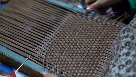 a craftsman handmade a bag, close up shot, insert shot